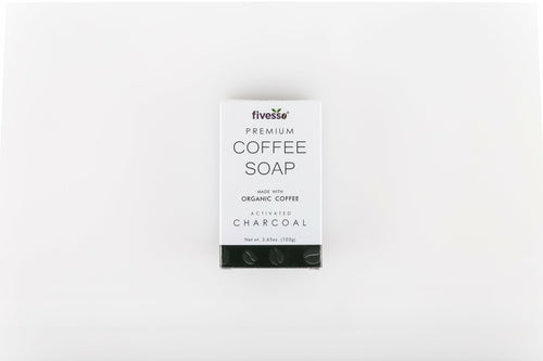 Activated charcoal coffee soap bar by ShopOn9india showing a dark, rectangular bar soap with textured surface and coffee scent.